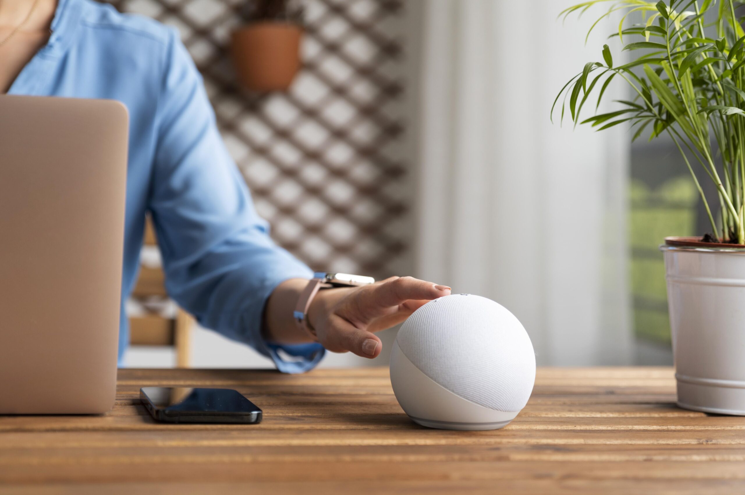 close-up-hand-touching-virtual-assistant